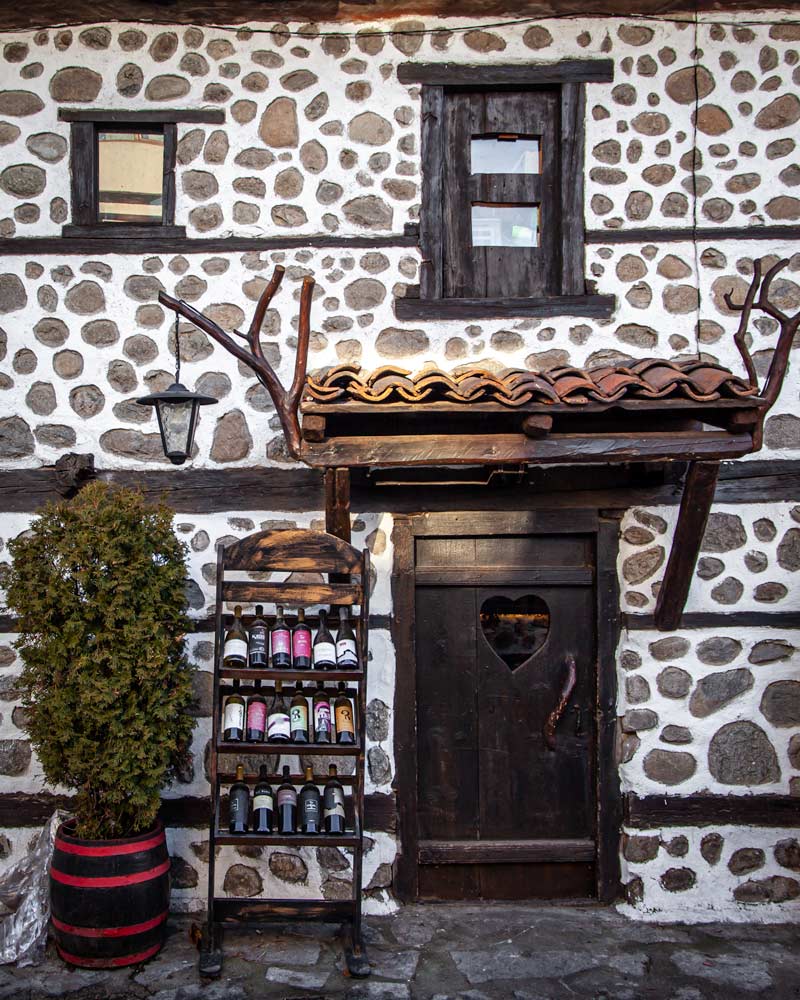 A stone restaurant with wine racks in Bansko old town