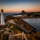 The Castlepoint lighthouse at sunrise, New Zealand