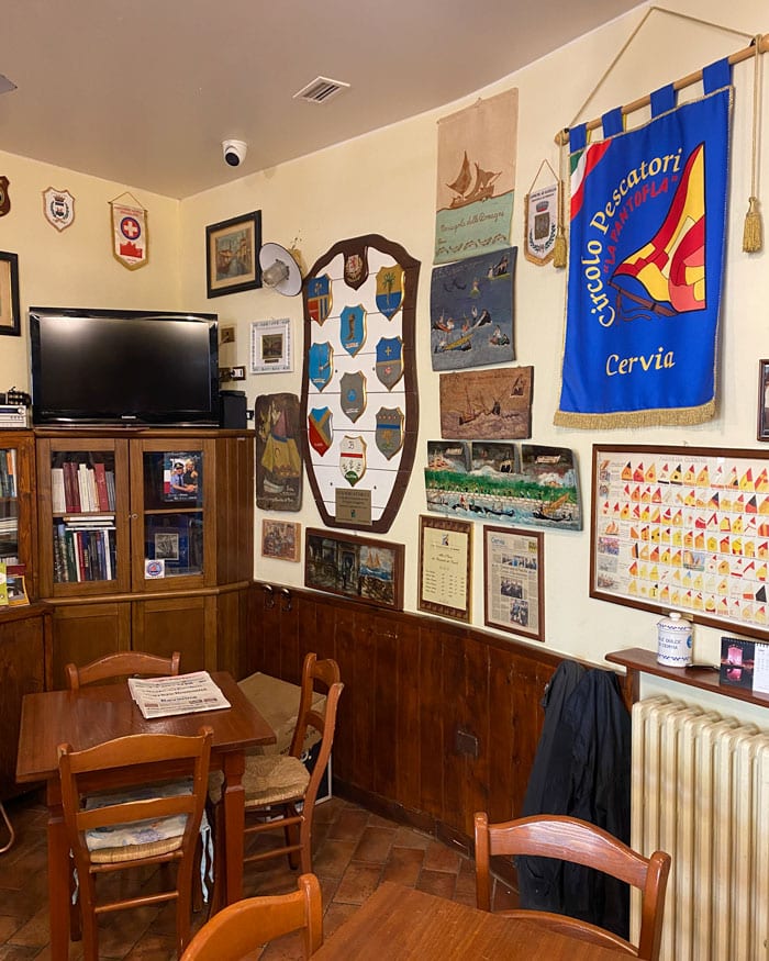 Emblems of the fishing boat flags in Circolo dei Pescatori