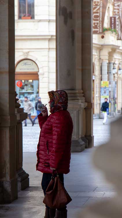 Karlovy Vary a lady drinks from a spa cup