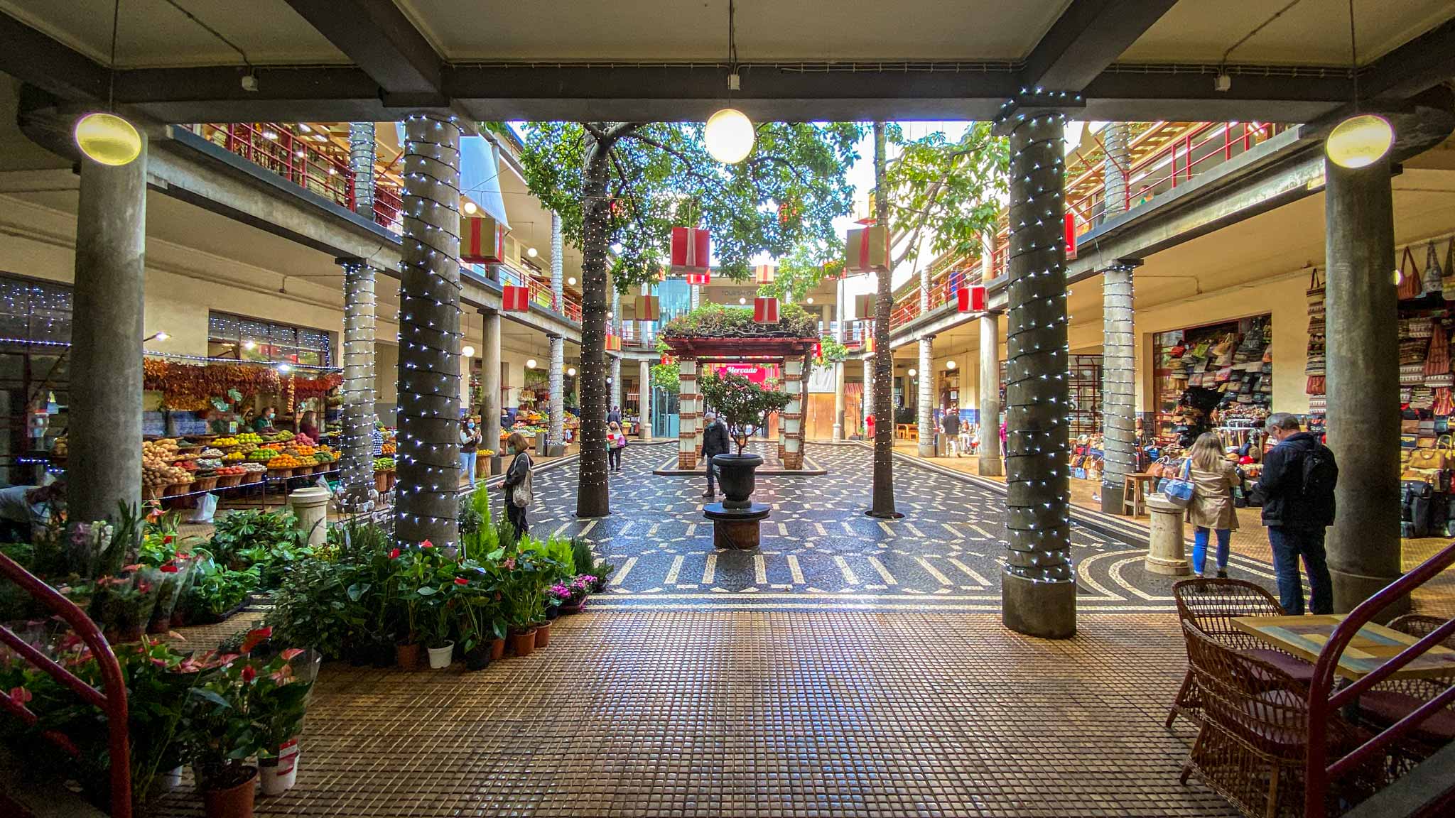 The local market in Funchal is packed with colourful fruits and vegetables, in an open air courtyard