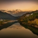 Sunset on the Shimanto river in Kochi Japan, with the mountains reflecting in the water