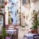 An outside restaurant in the white streets of Locorotondo Puglia