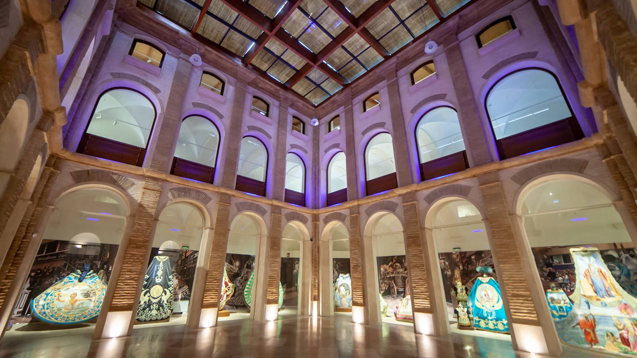 A two story building with impressive arched frames is home to the Semana Santa exhibit of outfits in Lorca Spain