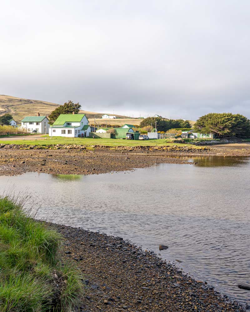 The white buildings and green roofs of Port Howard lodge