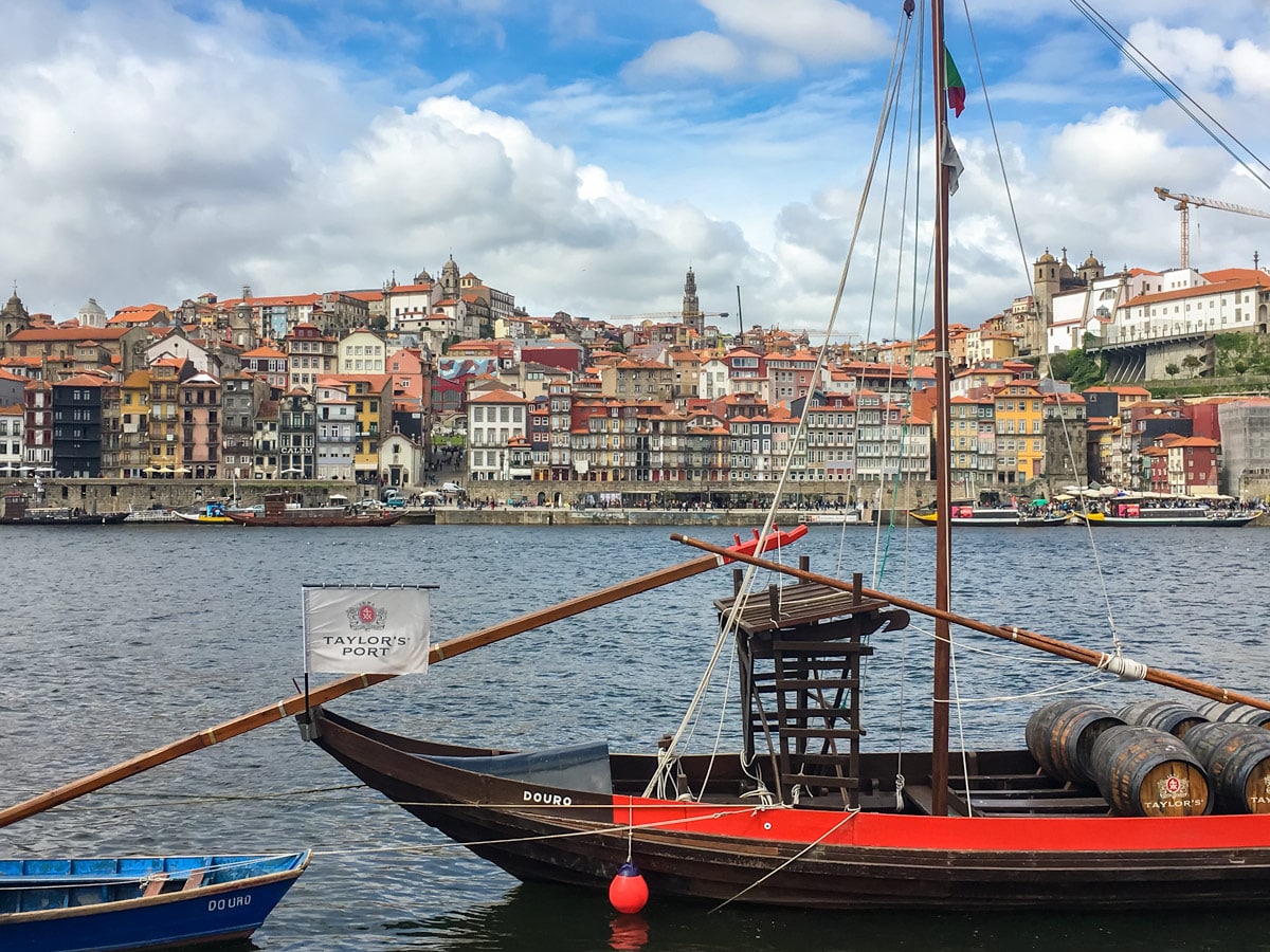 Traditional boats used to transport Port line the river