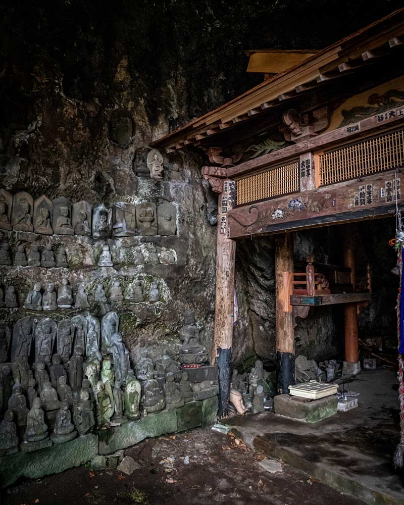 Inside the cave temple of the hotel where lots of statues sit