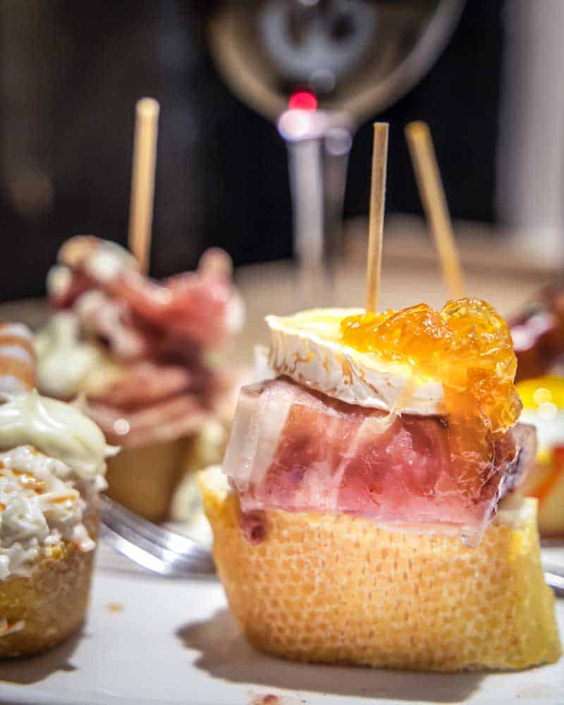 Pintxos of cheese and ham in San Sebastian