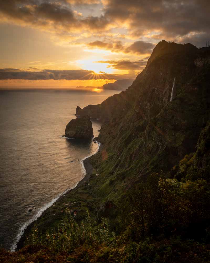 Sunrise in Santana as seen from the top cable car station looking out on sea cliffs and the atlântico ocean