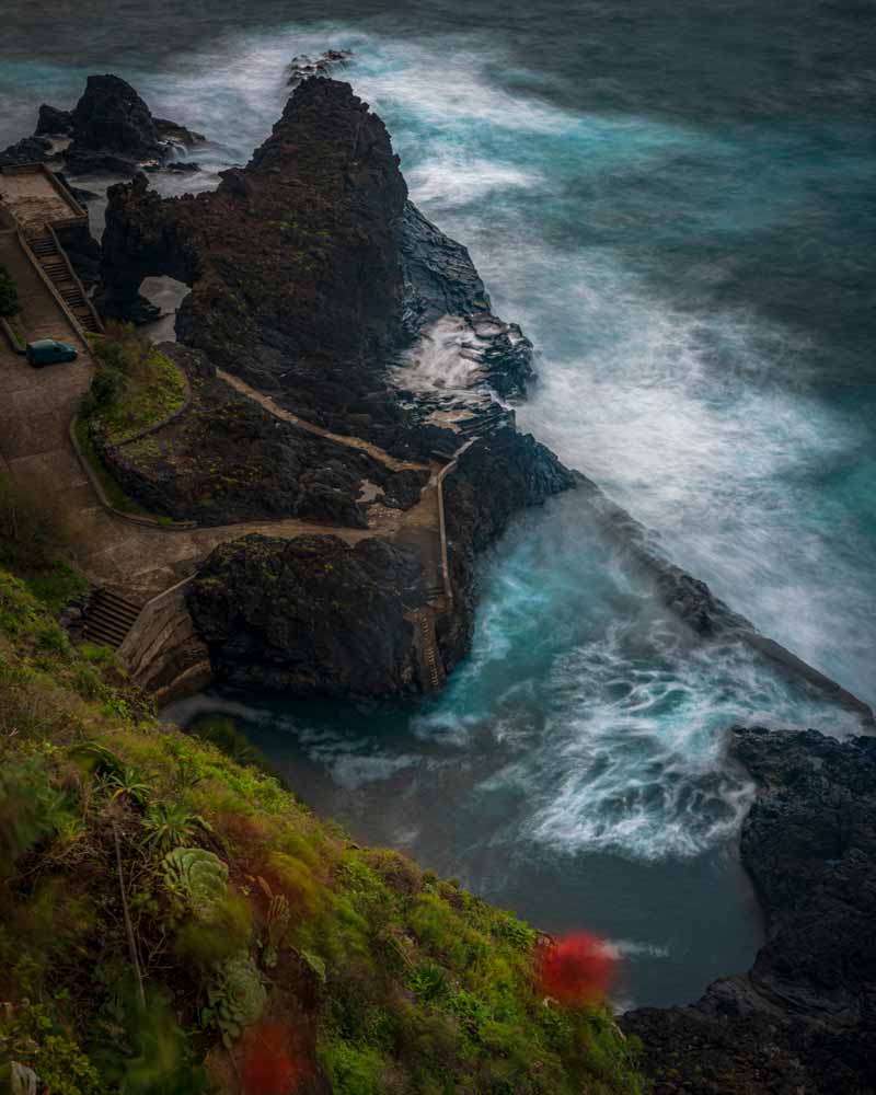 A Rocky natural swimming pool in Seixal with crashing waves