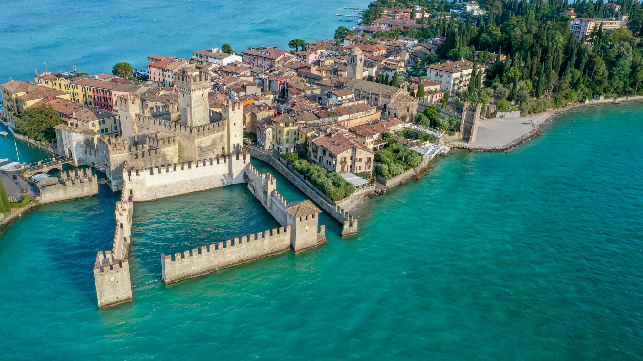 The castle of Sirmione as seen from above with the island behind it