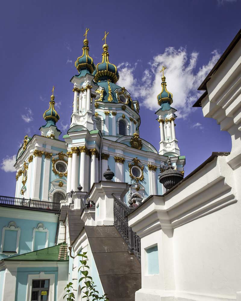 St Peters Cathedral in Kyiv atop a staircase, an orthadox style green cathedral