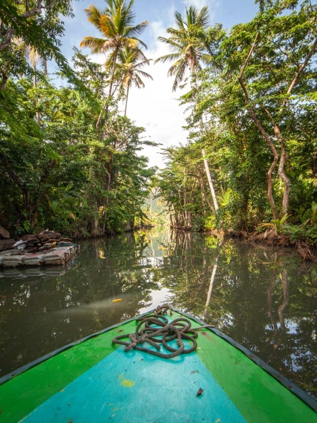 Reflections of the India River on a small boat in Dominica